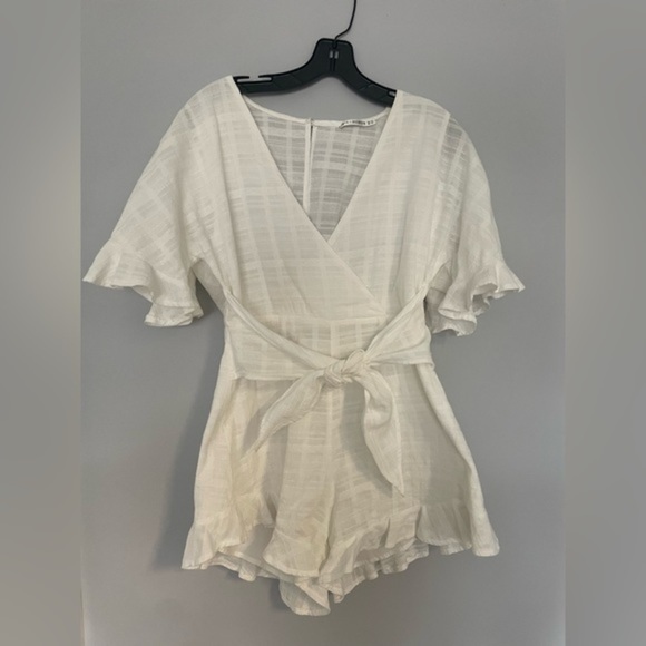 SAINTS & Secrets Flowy Romper with Sinched Waist Tie Front - Picture 1 of 9